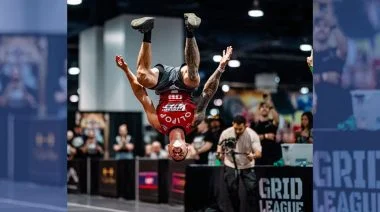An athlete is shown mid-air and upside down at Grid League.