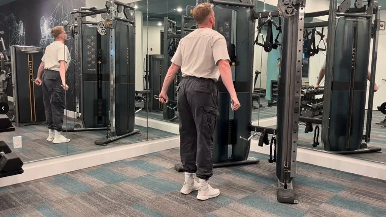 What Is the FITT Principle? Our tester performing the cable cross body triceps extension movement.