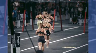 Women run during a CrossFit Games competition