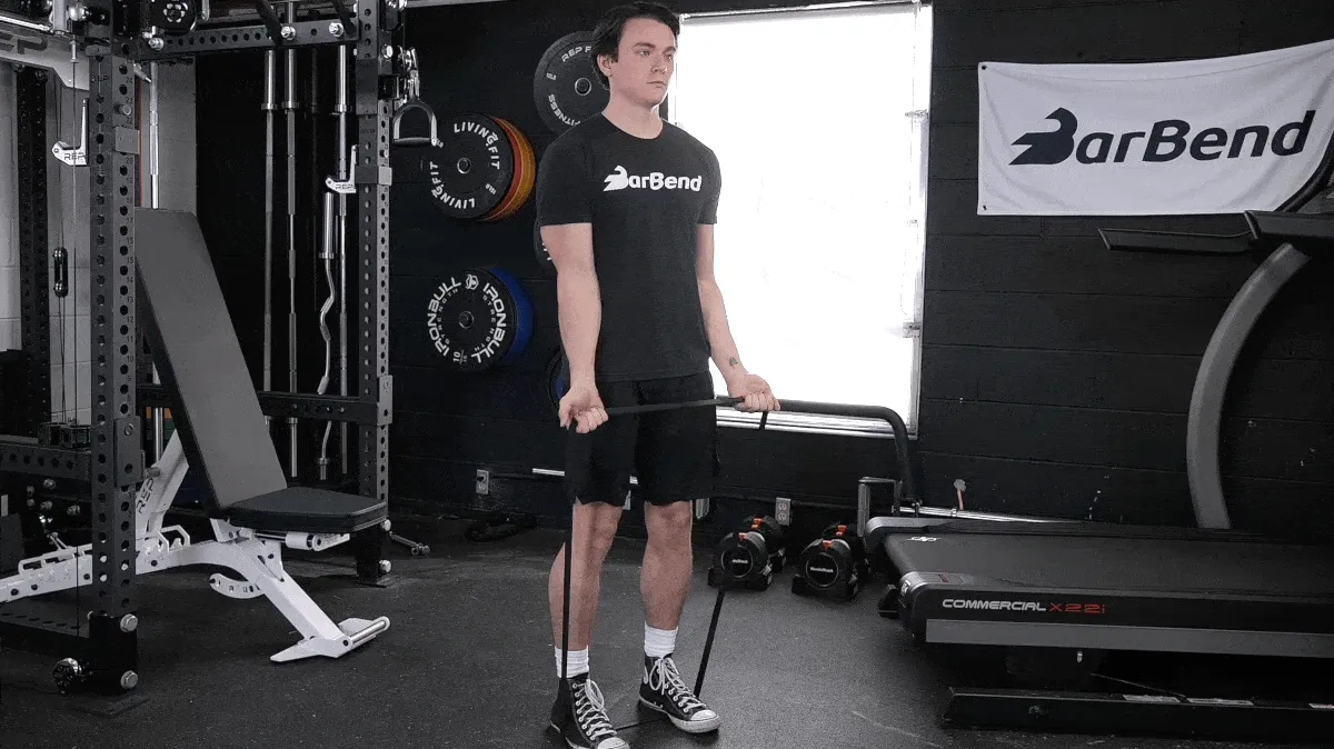 BarBend's Jake Herod performing the resistance band curl.