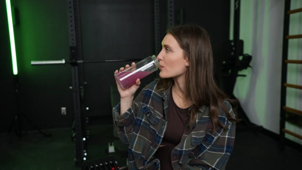 legion-recharge-sour-candy-drinking-mixed-drink Person drinking Legion Recharge
