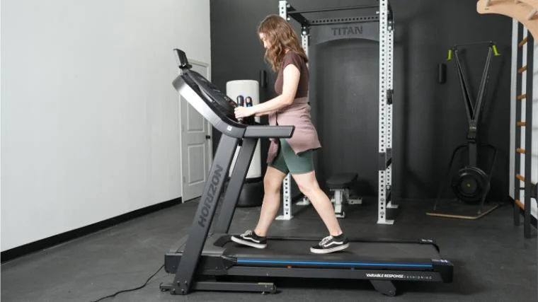 Our tester walks on a Horizon 7.0 AT treadmill