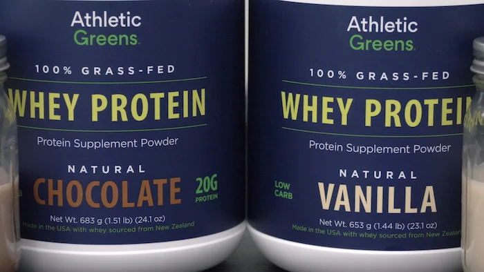Athletic Greens Whey tubs