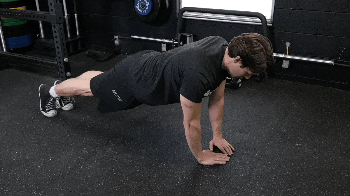 Jake performing diamond push-ups.