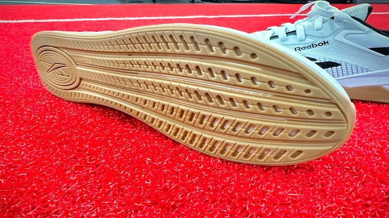 Looking at the full rubber outsole across the bottom of the Reebok Nano X4s