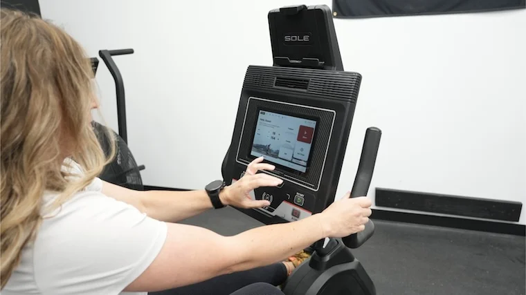 sole-lcr-exercise-bike-close-up-choosing-workout-on-screen Our tester toggling settings on the Sole LCR Exercise Bike