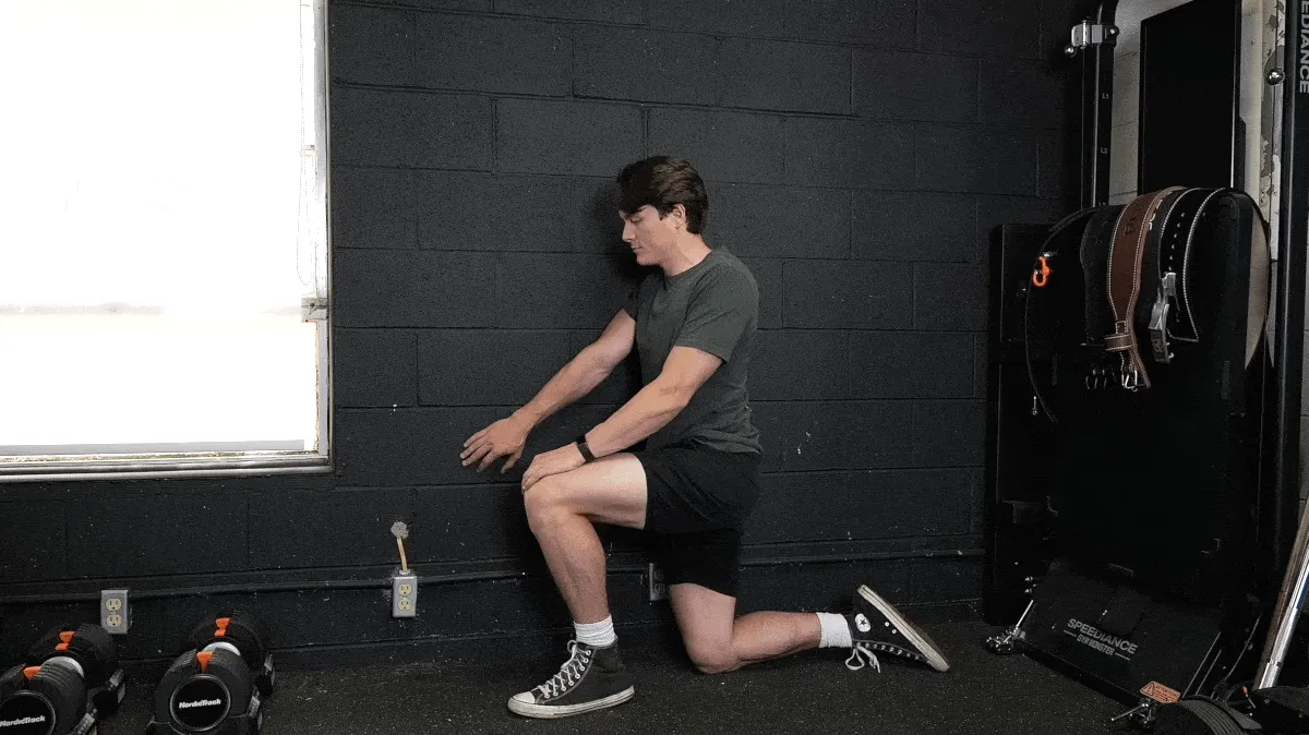 A person doing the shoulder CAR movement. 