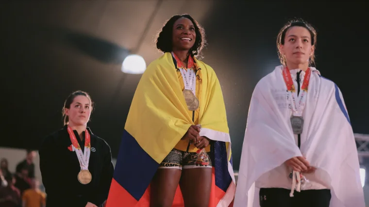 Yenny Alvarez atop the 59-kilogram podium