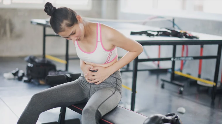 A person with stomach pain.