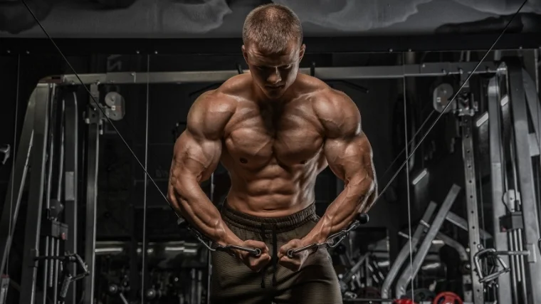 Bodybuilder doing chest flyes