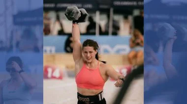 Emma Lawson is shown lifting in a competition.