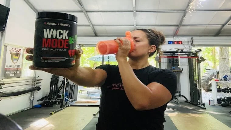 Our tester tasting a full serving of Jacked Factory Wick Mode pre-workout