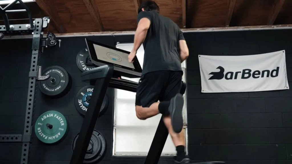A person running on a treadmill.