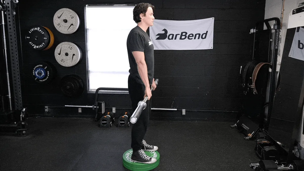 BarBend's Jake Herod performing Jefferson curls.