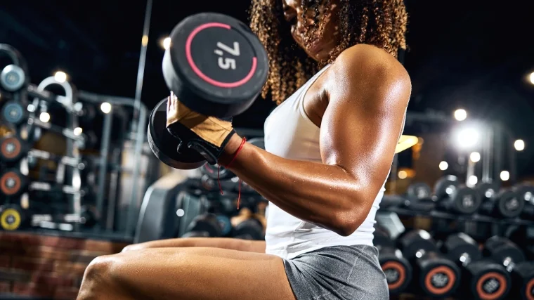 A person doing long head biceps exercises in the gym.