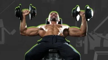 A person doing chest exercises with dumbbells on a bench.