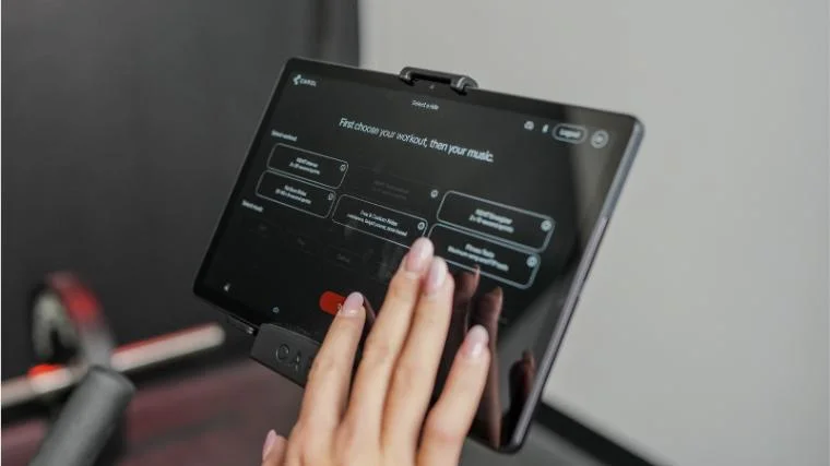 Our tester using the touchscreen on the CAROL Bike.
