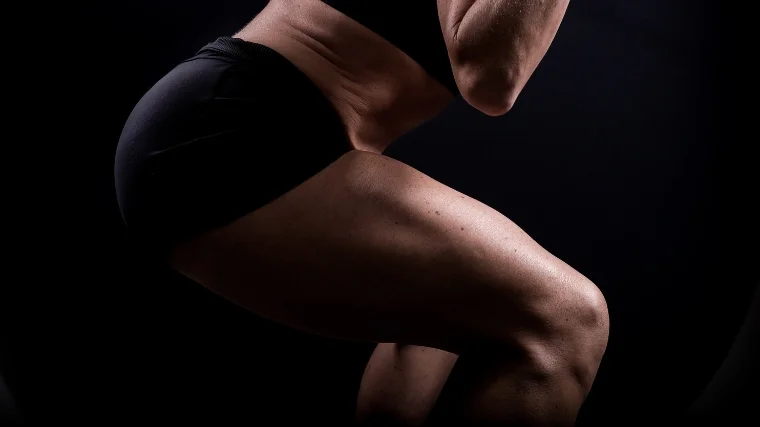 A person working on their glutes.