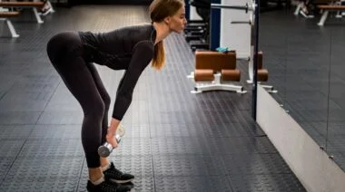dumbbell stiff leg deadlift featured image barbend
