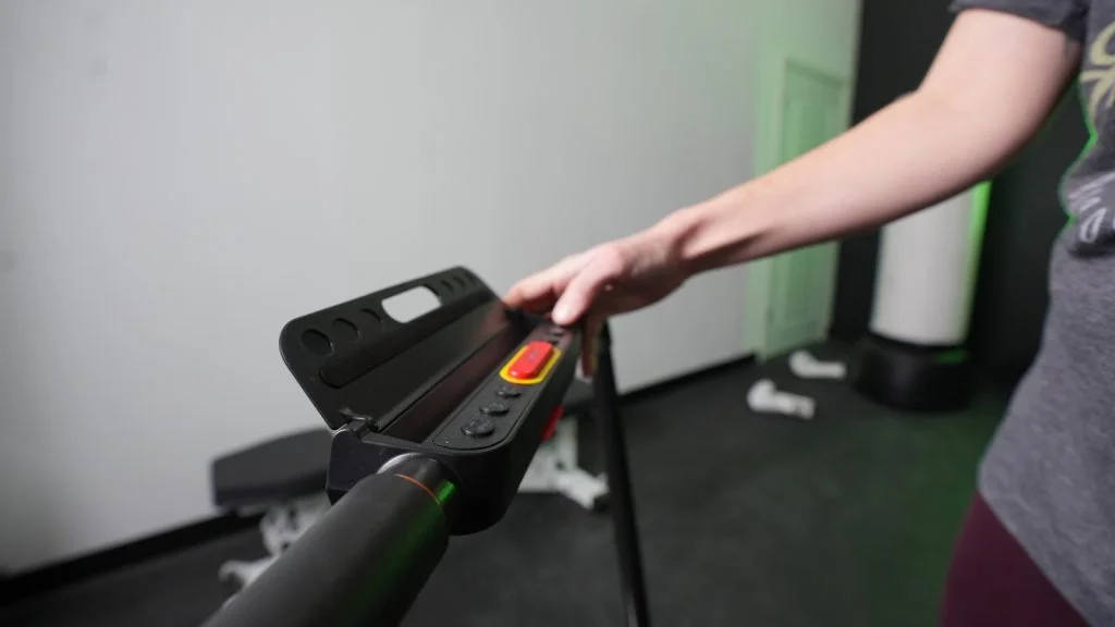 Folding handlebar on the Urevo 2-in-1 Under-Desk Treadmill.