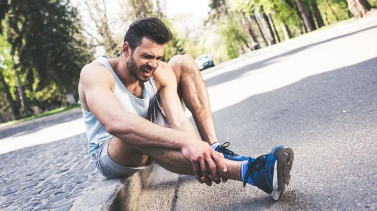 A jogger feeling pain in their shins.