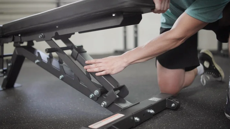 Jake Adjusting the Force USA Commercial FID Bench to the Decline Position