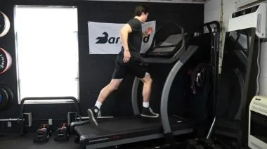 A person running on a treadmill.