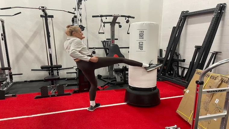 Our tester using FightCamp for a kickboxing session