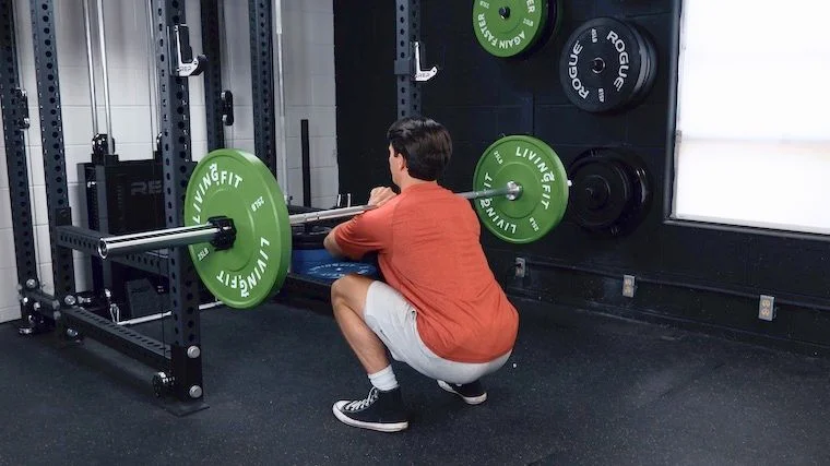 BarBend's Jake Herod performing the front squat.