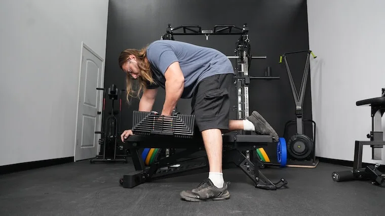 powerblock-pro-100-exp-adjustable-dumbbell-row-workout Our tester performing a row with the PowerBlock Pro 100 EXP Adjustable Dumbbells