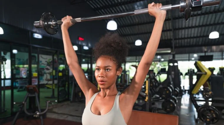 A person training with a barbell.