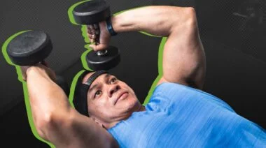 A person performs dumbbell skull crushers.