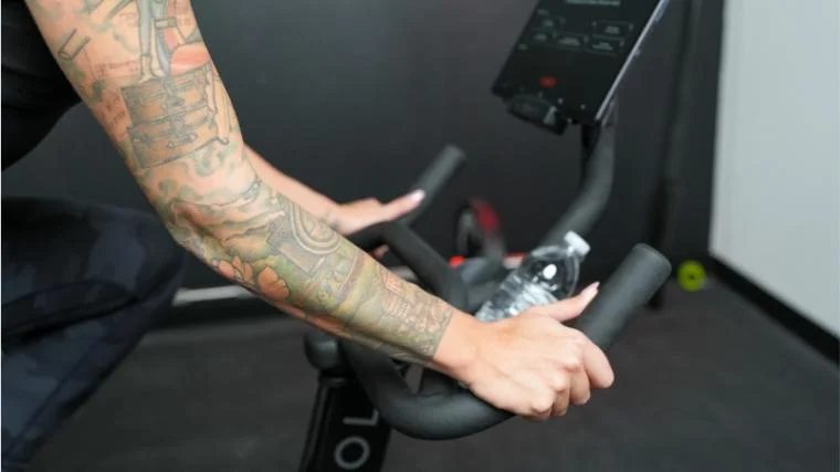 Our tester doing a REHIT workout on the CAROL Bike.
