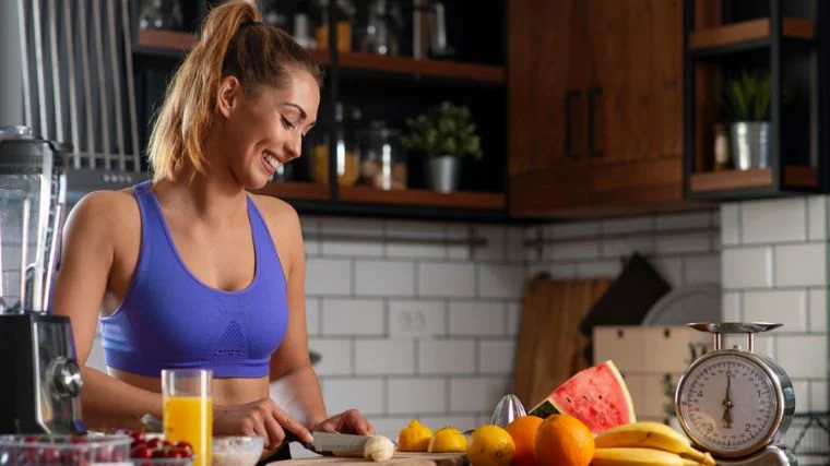 A person making their own pre-workout drink.