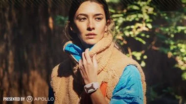 A woman wearing an Apollo Neuro.