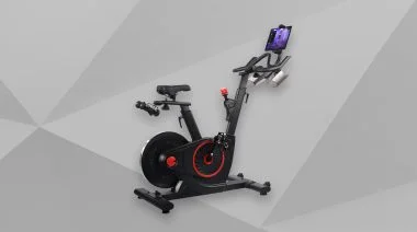 exercise bike on gray background