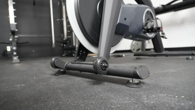 Feet and small wheels on the Stryde Bike.