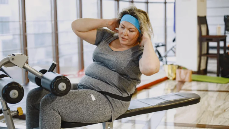 A person doing workout exercise in home gym