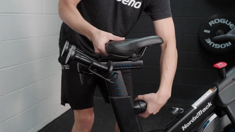 Jake Adjusting the Padded Seat on the NordicTrack S27i