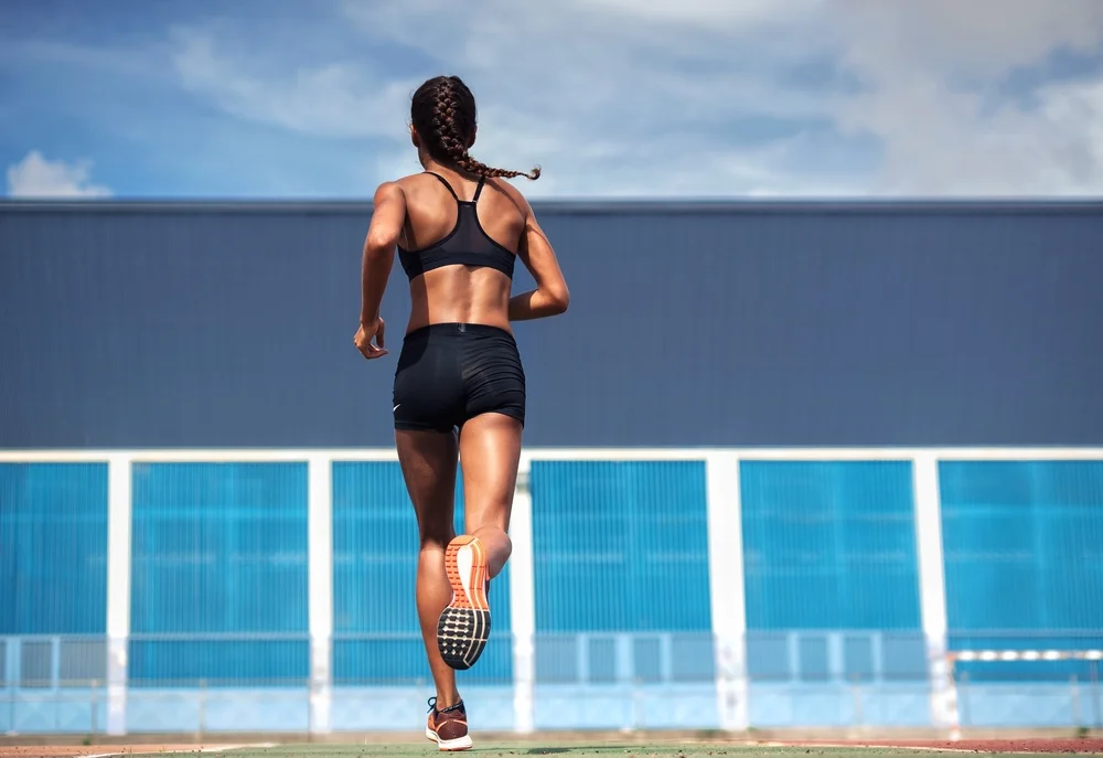 Woman Running in Sports Bra