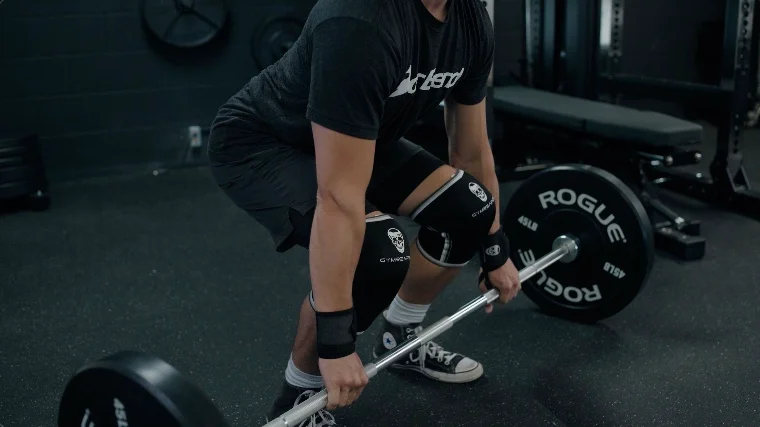 Jake Setting Up for a Power Clean with the Gymreapers Knee Sleeves