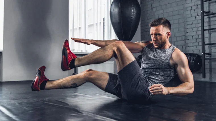 man performing warm-up circuit