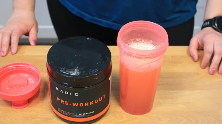 Our tester finishes mixing a serving of Kaged Muscle Pre-Workout