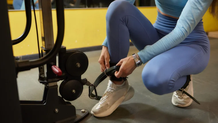 Woman using ankle strap