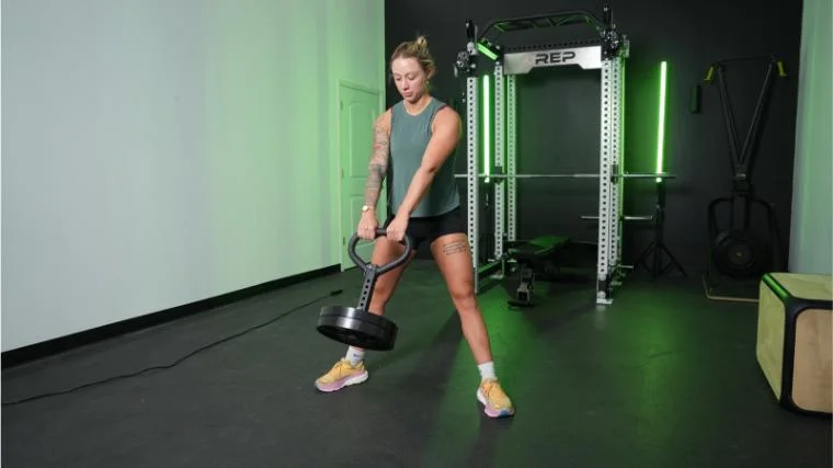 Our tester using the Titan Fitness Plate Loadable Kettlebell.