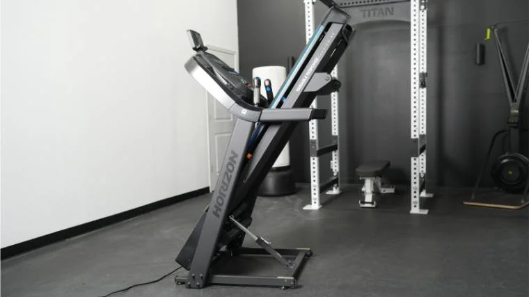 a treadmill with the deck folded upright