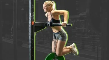 A person using a gym equipment for one of the best triceps exercises.
