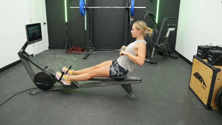 Our tester on one of the Best Foldable Rowing Machines.