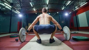 A person doing a snatch.