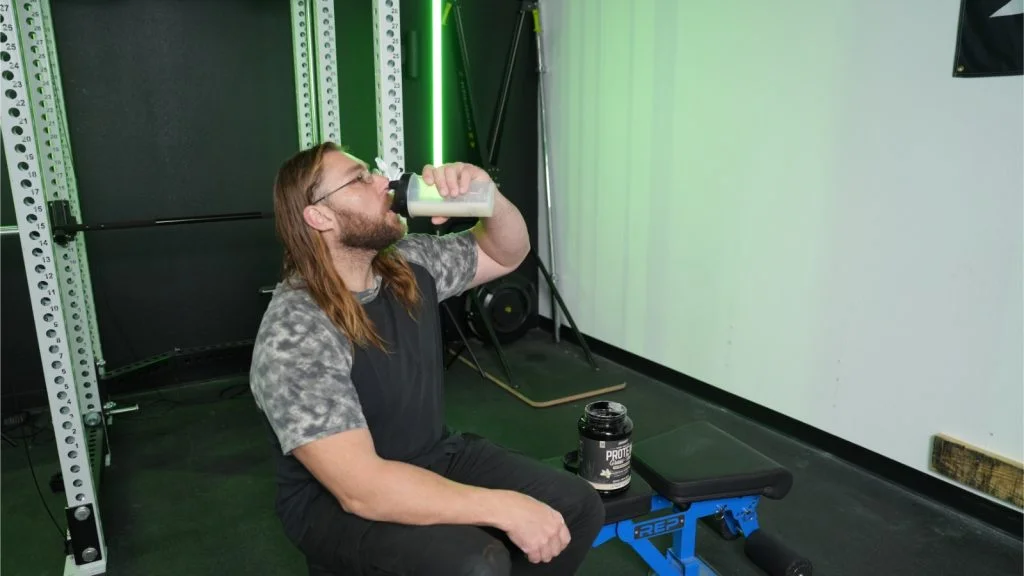 Our tester drinking Onnit Whey Protein.